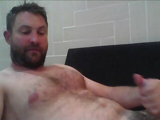 Nice thick load all over that hairy chest