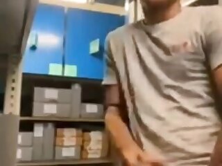 Beautiful guy jerking at work