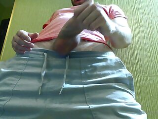 Hairy stud jerks his thick dick and sprays a huge load onto the camera lens