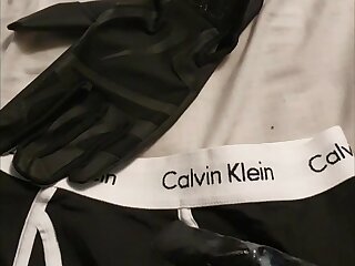 POV of cumming onto leather gloves and boxers