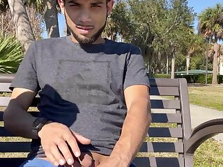 Playing with his softie in public