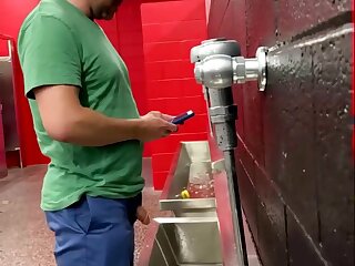 Cut dick pissing in urinal