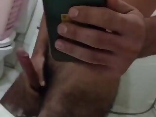 Turkish guy is fucking hairy and jerking off in bathroom