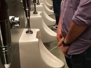 Cut dick pissing in urinal