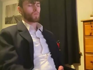 Hot guy in a suit having a quick wank