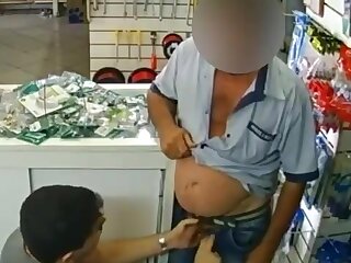 Daddy gets his dick sucked in a store