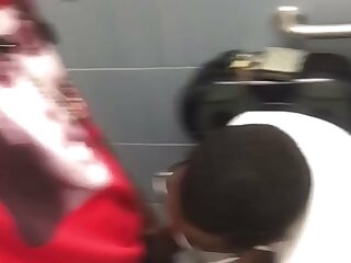 Cruiser letting stranger suck him up in public bathroom stall