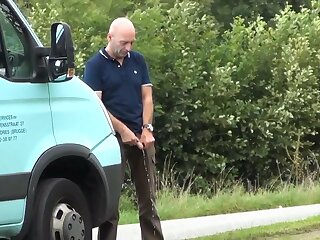 Belgian van driver pissing in public with a long uncut dick