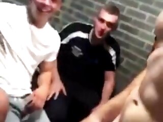 Rugby boys messing around and playing with their cocks