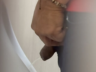 Chiricanian middle aged man spyied while pissing