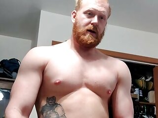 Redhead hunk fucks his toy and cums