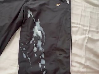 Guy shoots a huge load on trackie