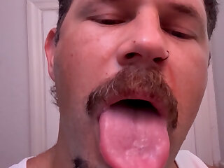 Sexy daddy drooling and spitting showing off his massive tongue