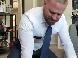 Guy fucking himself in a suit