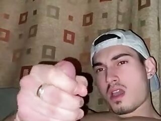 Hot college stud strikes his juicy cock and cums all over himself