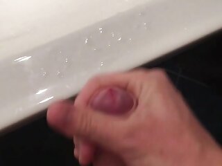 Quick and short video of jack off and cumming all over in the bathroom