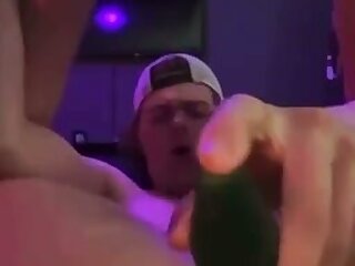 Cute white guy wearing Converse sneakers fucks his own hole with what looks like a long cucumber