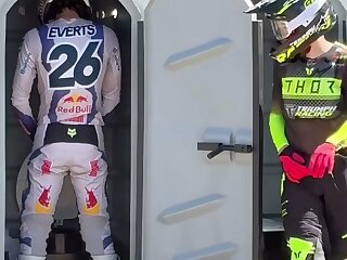 Motocross riders at track in gear.