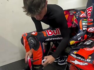 Watch this super cute professional racing biker in his leather gear.