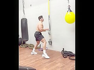 Logan Foote shows off his lean muscular body kickboxing